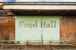 Trend of Food Hall Travel - Food Hall Doors and Picnic Tables