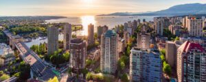 Where to Stay in Vancouver - Downtown Vancouver Cityscape on West Coast of Pacific Ocean. Sunset. Aerial Panorama
